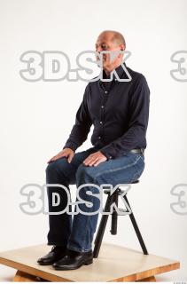 Sitting pose blue deep shirt jeans of Ed 0008
